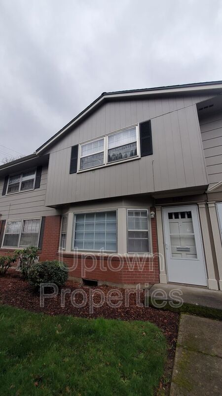 FREE First Month's Rent: 2BD/1.5BTH Townhome + Private Fenced Patio + W/D in unit + Parking Included property image