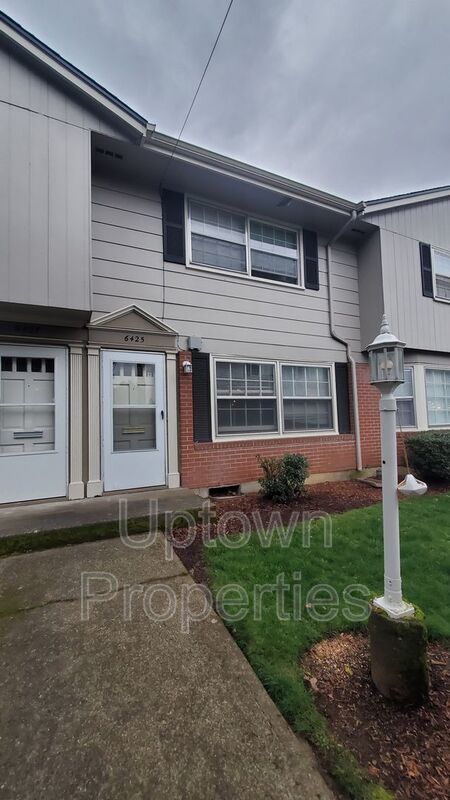 FREE First Month's Rent: 2BD/1.5BTH Townhome + Private Fenced Patio + W/D in unit + Parking Included property image