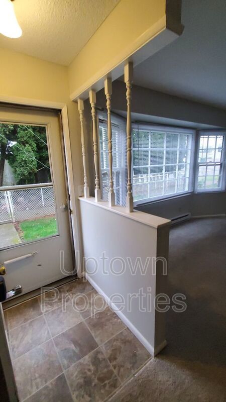 FREE First Month's Rent: 2BD/1.5BTH Townhome + Private Fenced Patio + W/D in unit + Parking Included property image