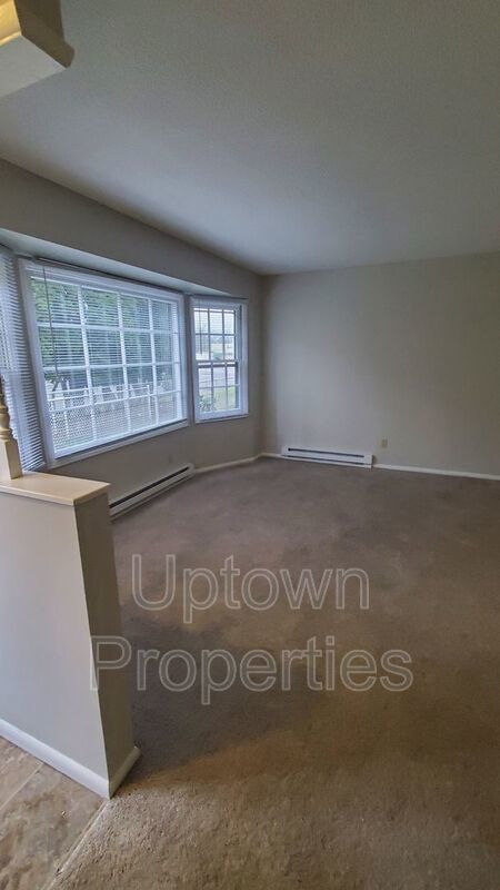 FREE First Month's Rent: 2BD/1.5BTH Townhome + Private Fenced Patio + W/D in unit + Parking Included property image