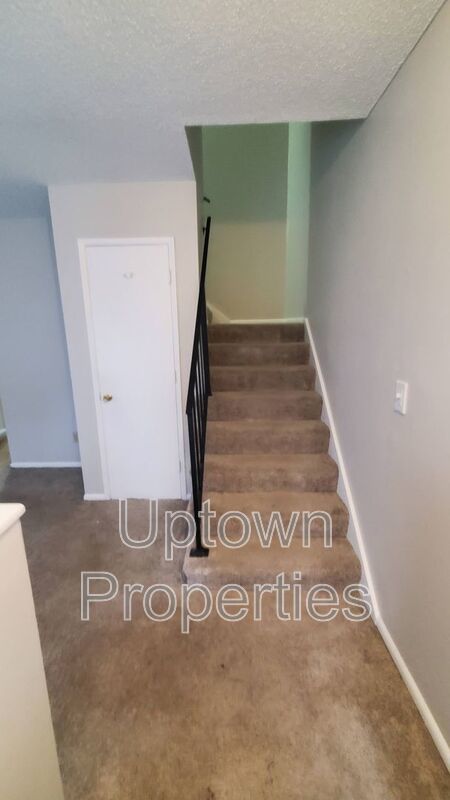 FREE First Month's Rent: 2BD/1.5BTH Townhome + Private Fenced Patio + W/D in unit + Parking Included property image