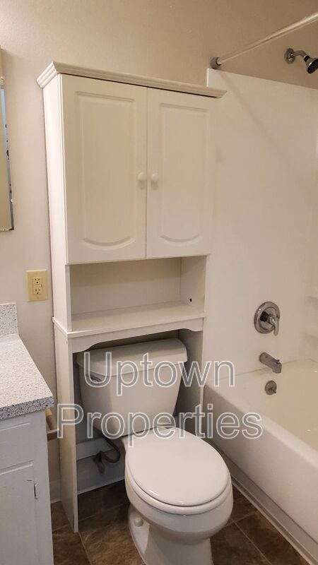 FREE First Month's Rent: 2BD/1.5BTH Townhome + Private Fenced Patio + W/D in unit + Parking Included property image
