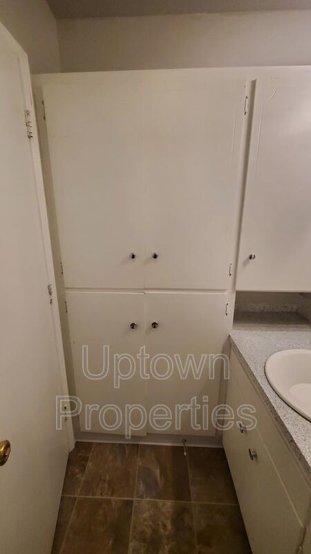 FREE First Month's Rent: 2BD/1.5BTH Townhome + Private Fenced Patio + W/D in unit + Parking Included property image