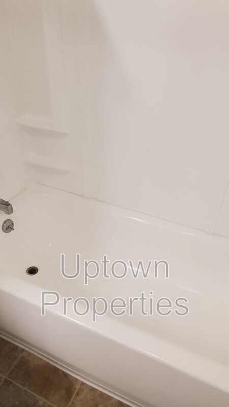 FREE First Month's Rent: 2BD/1.5BTH Townhome + Private Fenced Patio + W/D in unit + Parking Included property image