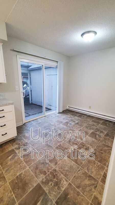 FREE First Month's Rent: 2BD/1.5BTH Townhome + Private Fenced Patio + W/D in unit + Parking Included property image