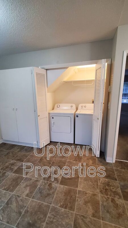 FREE First Month's Rent: 2BD/1.5BTH Townhome + Private Fenced Patio + W/D in unit + Parking Included property image