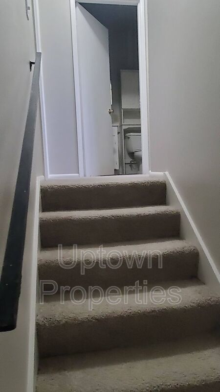 FREE First Month's Rent: 2BD/1.5BTH Townhome + Private Fenced Patio + W/D in unit + Parking Included property image
