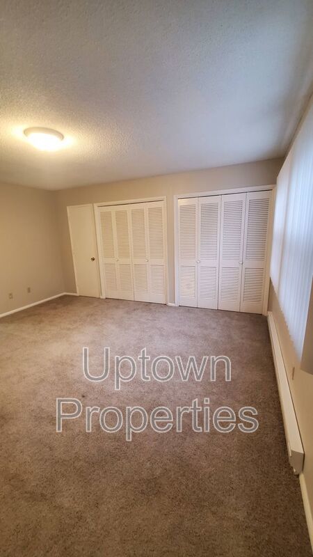 FREE First Month's Rent: 2BD/1.5BTH Townhome + Private Fenced Patio + W/D in unit + Parking Included property image