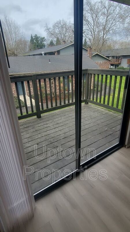 Top Floor Renovated 2BR/1.5Bath + W/D + Carport + Large Private Deck Included! property image