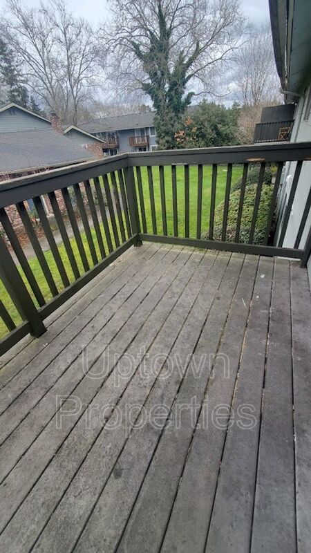 Top Floor Renovated 2BR/1.5Bath + W/D + Carport + Large Private Deck Included! property image