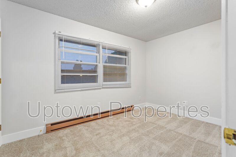 FREE First Month's Rent: 2BD/1.5BTH Townhome + Private Fenced Patio + W/D in unit + Parking Included property image