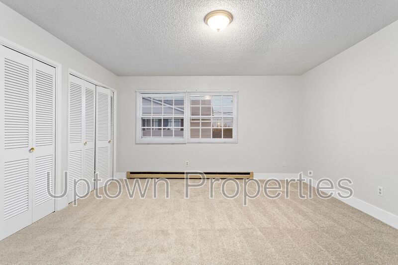 FREE First Month's Rent: 2BD/1.5BTH Townhome + Private Fenced Patio + W/D in unit + Parking Included property image