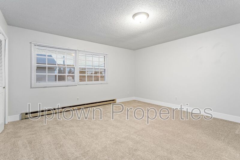 FREE First Month's Rent: 2BD/1.5BTH Townhome + Private Fenced Patio + W/D in unit + Parking Included property image