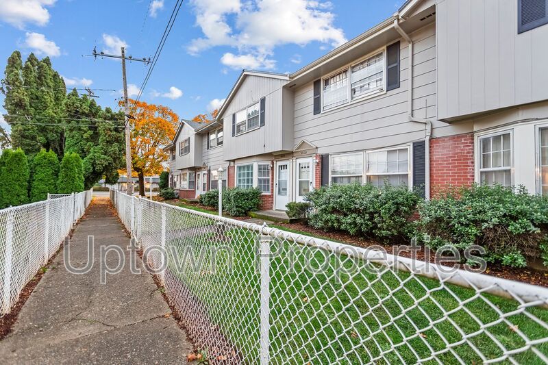 FREE First Month's Rent: 2BD/1.5BTH Townhome + Private Fenced Patio + W/D in unit + Parking Included property image